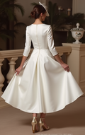 Elegant White Mini Short Wedding Dress with a Layered Skirt for Extra Volume and Drama